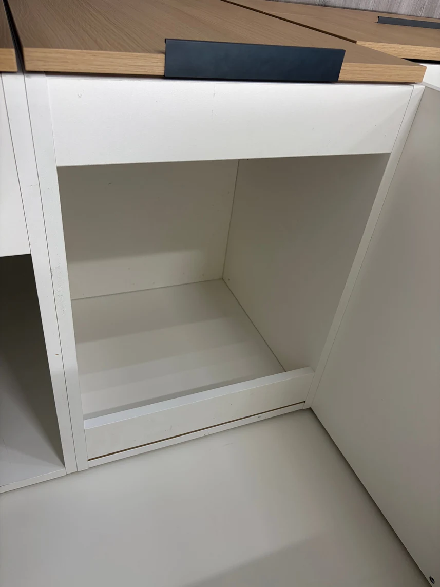 Highland frameless cabinet interior — all-white 1/2 inch plywood and melamine box with rear stretcher