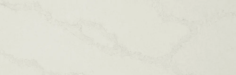 Calacatta Nuvo Caesarstone quartz with brass hardware