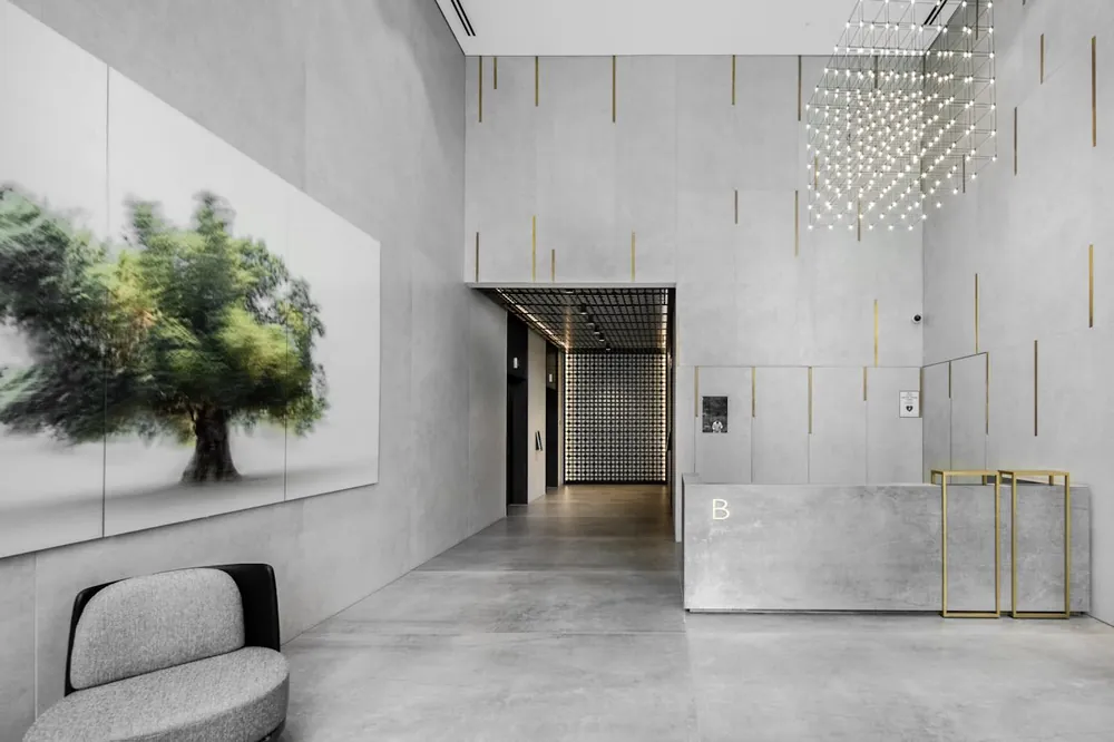 Domoos Dekton sintered surface with brass hardware