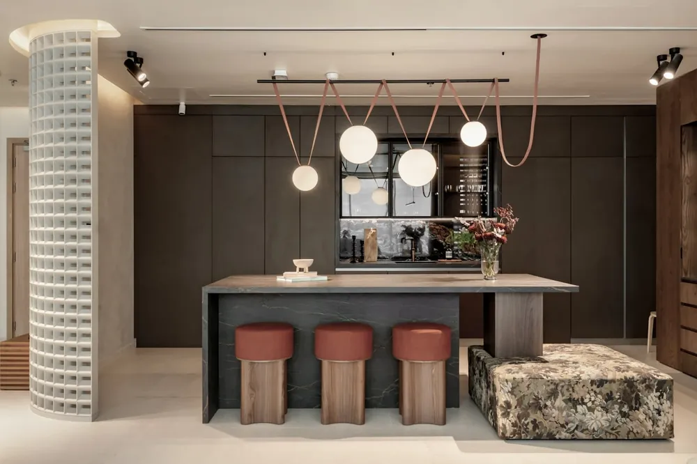 Nacre Dekton sintered surface with brass hardware