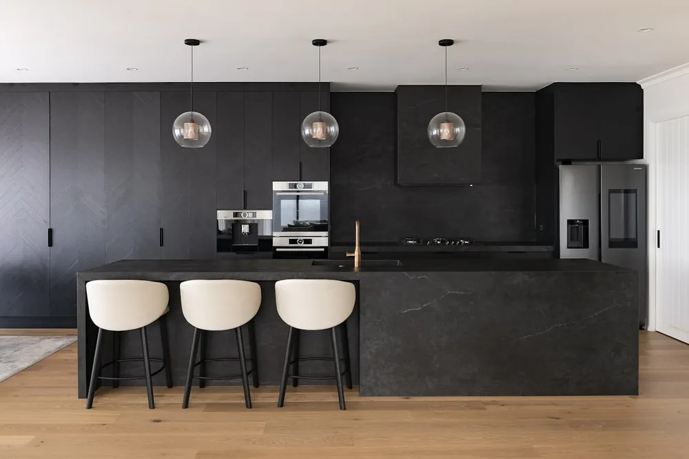 Zenith Dekton sintered surface with brass hardware