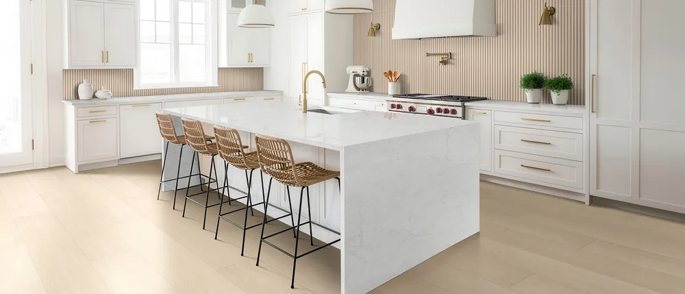 Calacatta Miraggio Cove MSI quartz with brass hardware