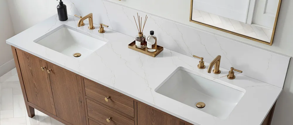 Calacatta Miraggio Gold MSI quartz with brass hardware