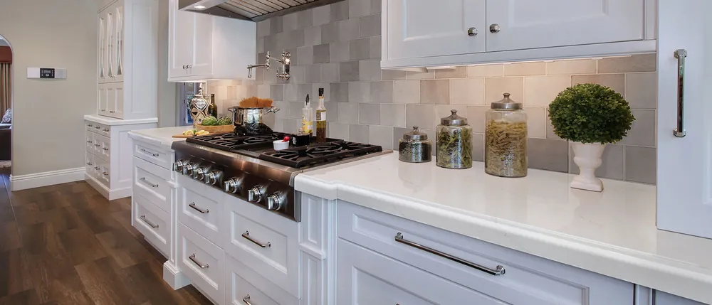 Calacatta Miraggio MSI quartz with brass hardware