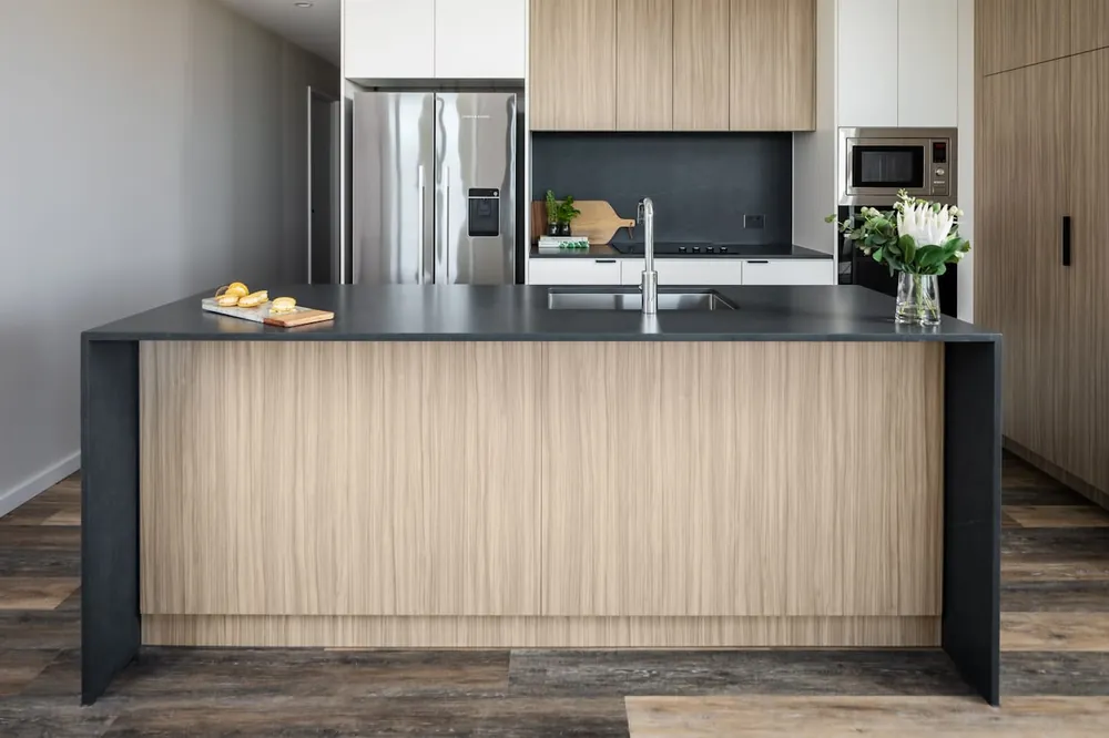 Calypso Silestone quartz with brass hardware