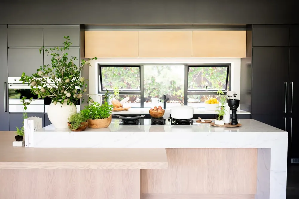 Eclectic Pearl Silestone quartz with brass hardware
