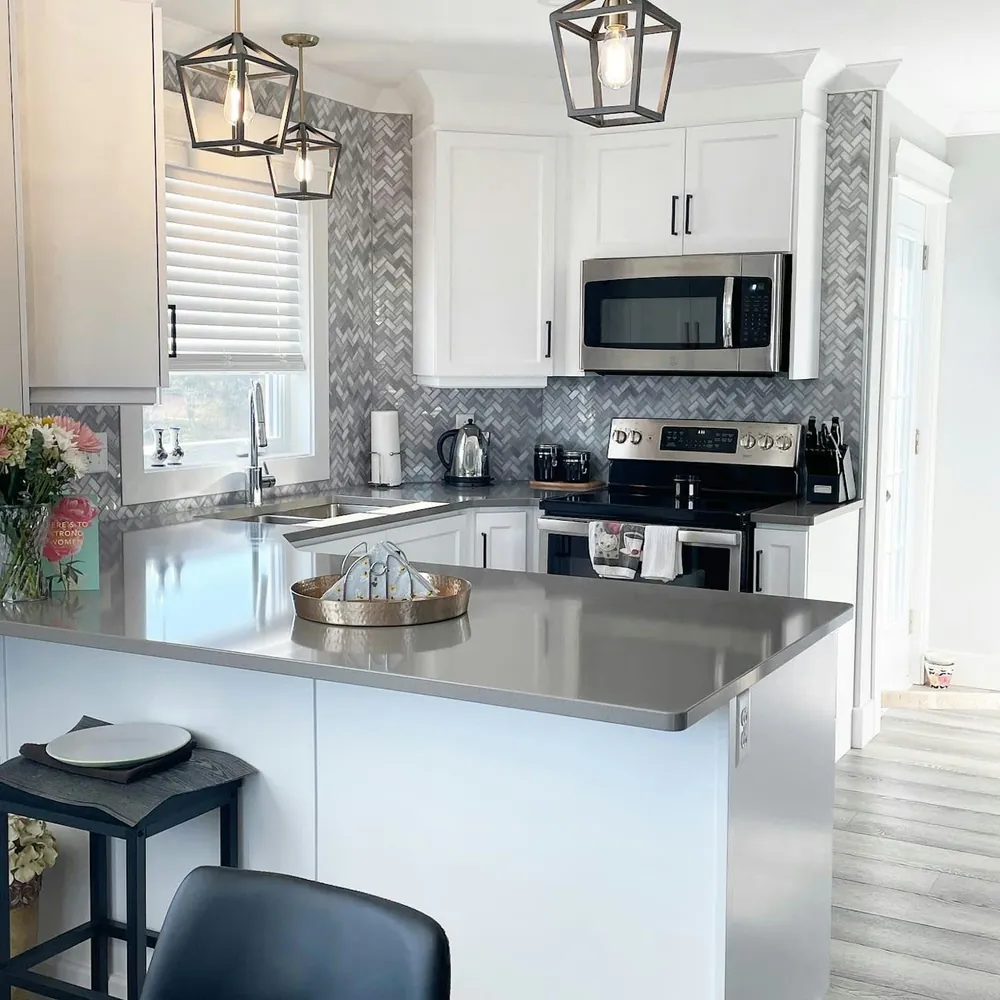 Grey Expo Silestone quartz with brass hardware