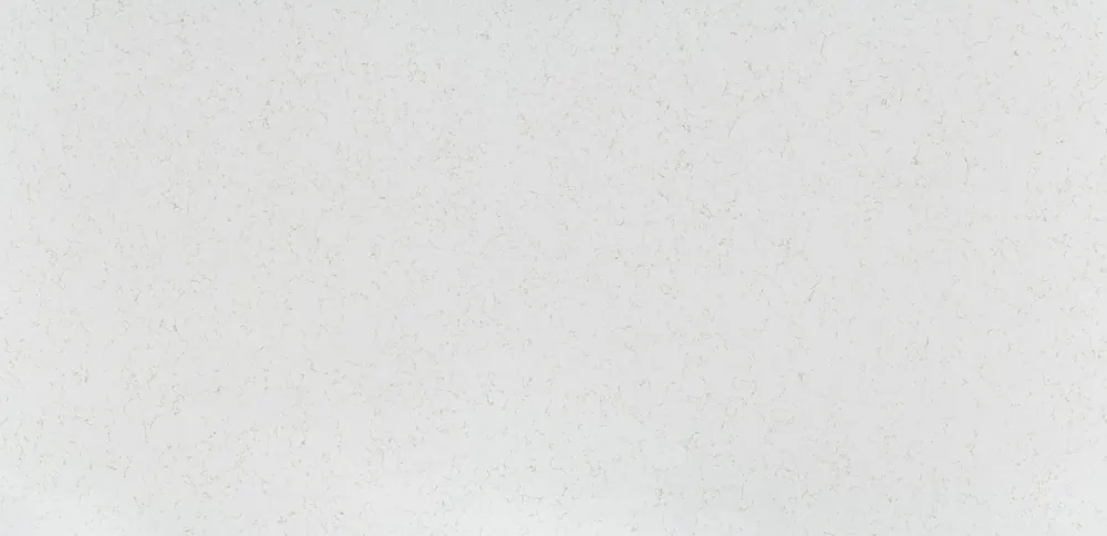 Miami Oro Silestone quartz with brass hardware