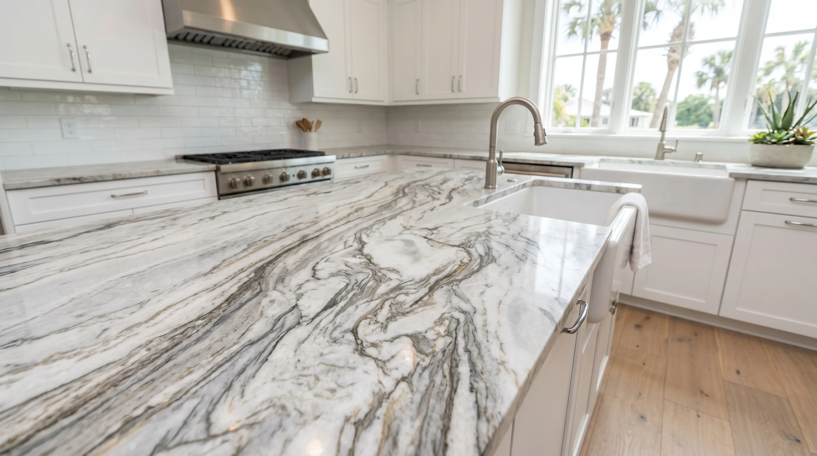 Close-up of warm wood Delray Beach kitchen cabinetry and stone countertop detail