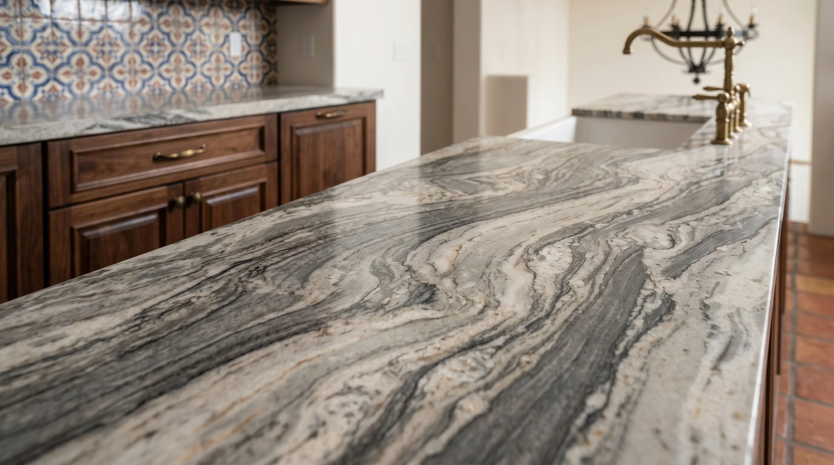 Close-up of warm wood Lake Worth kitchen cabinetry and stone countertop detail