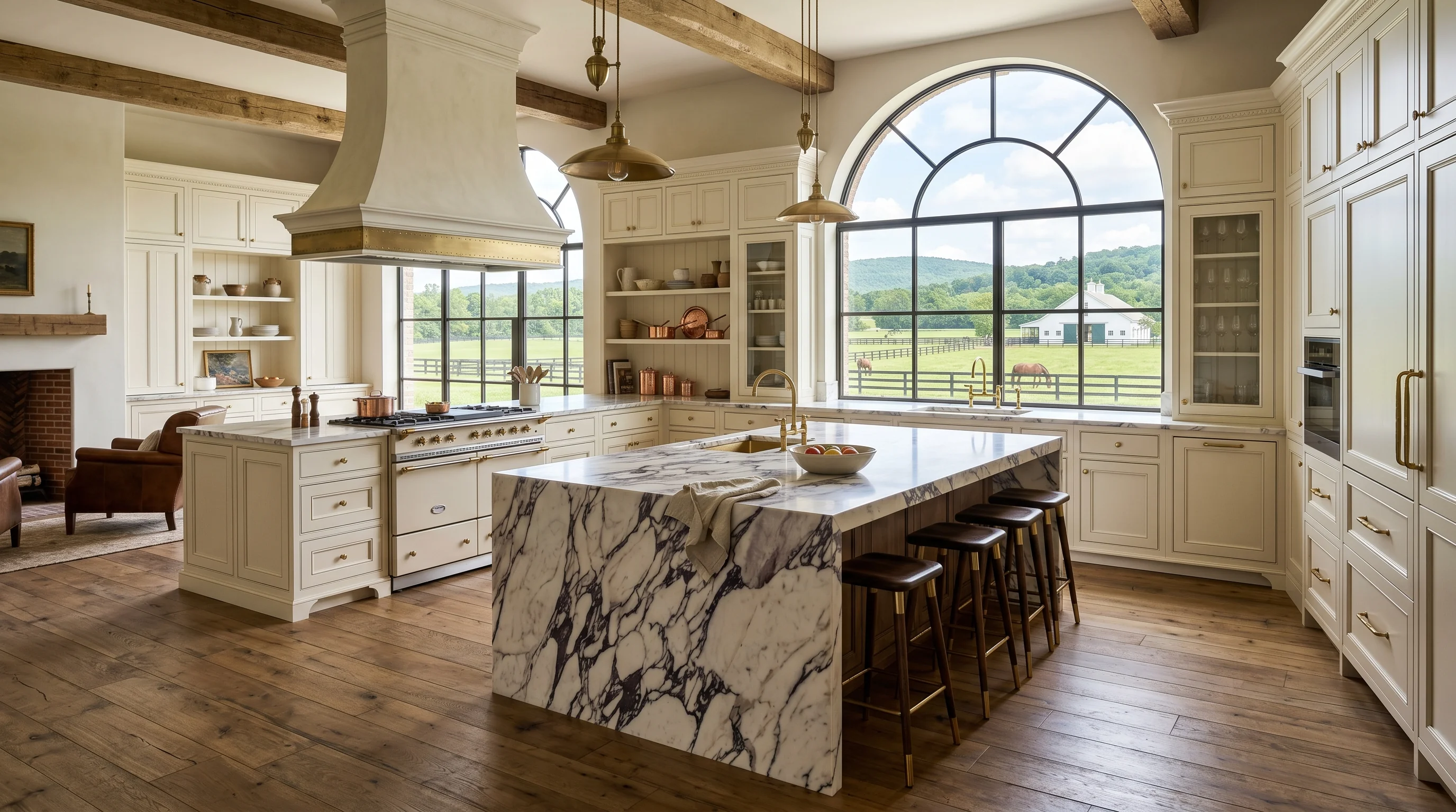 Wide cinematic Wellington kitchen with marble island and arched windows
