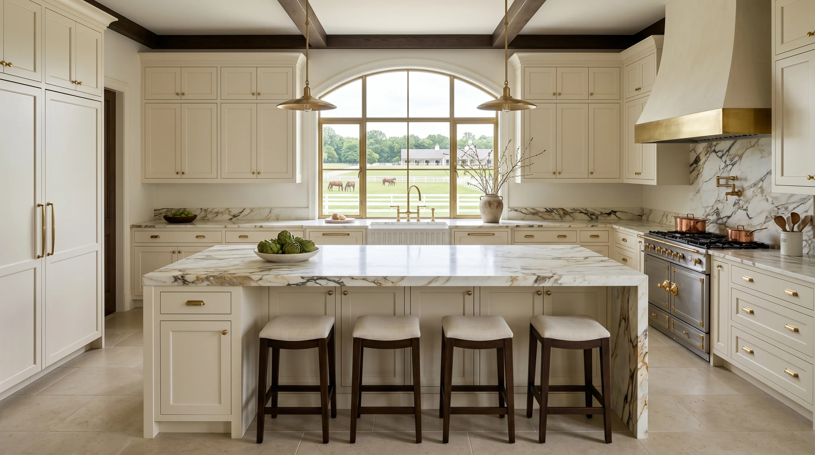 Panoramic finished Wellington kitchen with marble island and brass hardware