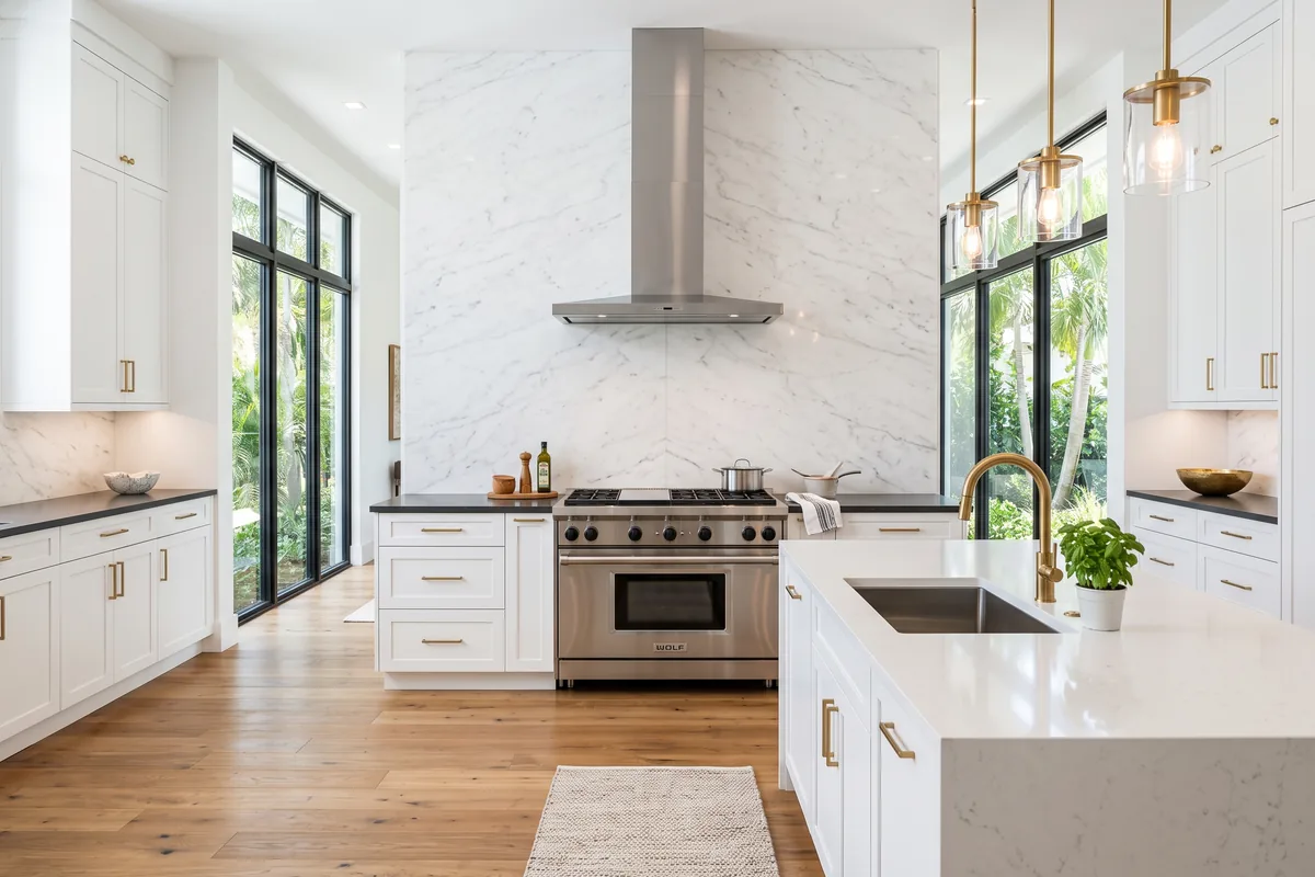 Palm Beach County kitchen project with white cabinets and a full marble slab backsplash